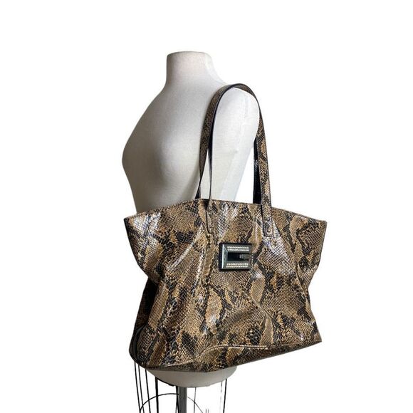 Guess Handbags - Guess large tote python print on faux leather large Guess chrome medalli…